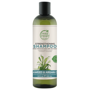 Image of Petal Fresh Strengthening Seaweed Shampoo with a blue label and a picture of seaweed leaves. The text on the bottle reads 'Petal Fresh, Strengthening Seaweed Shampoo, Strengthens & Fortifies, 100% Vegan, No Sulfates, No Harsh Preservatives, pH Balanced'