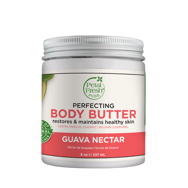 Image of Petal Fresh Guava Nectar Body Butter Perfecting. The jar is open, revealing a creamy, off-white body butter inside, with a lush guava fruit on the label. The background features tropical leaves, highlighting the natural ingredients used in the product.